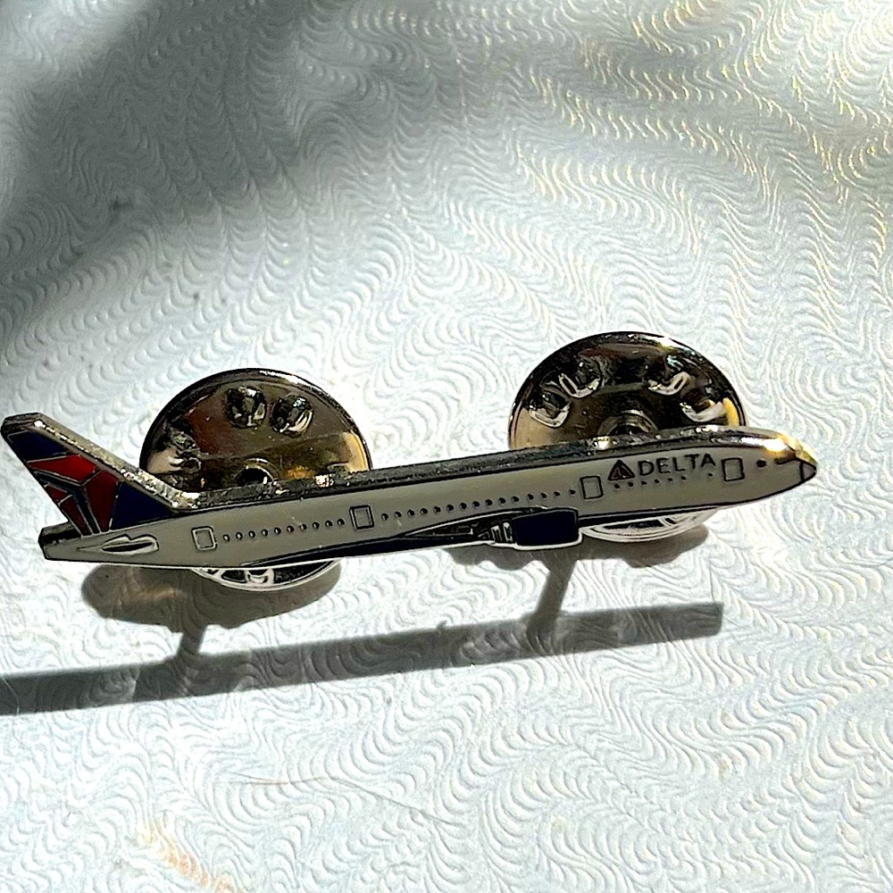 Delta Airlines Airplane Replica lapel tac pin which measures 1 1/2” long.